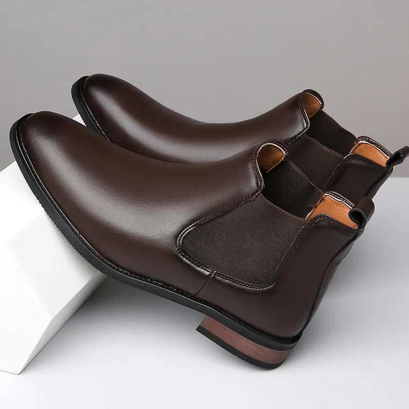 Men's black and light brown pointed toe Chelsea boots with a low heel and artificial PU upper