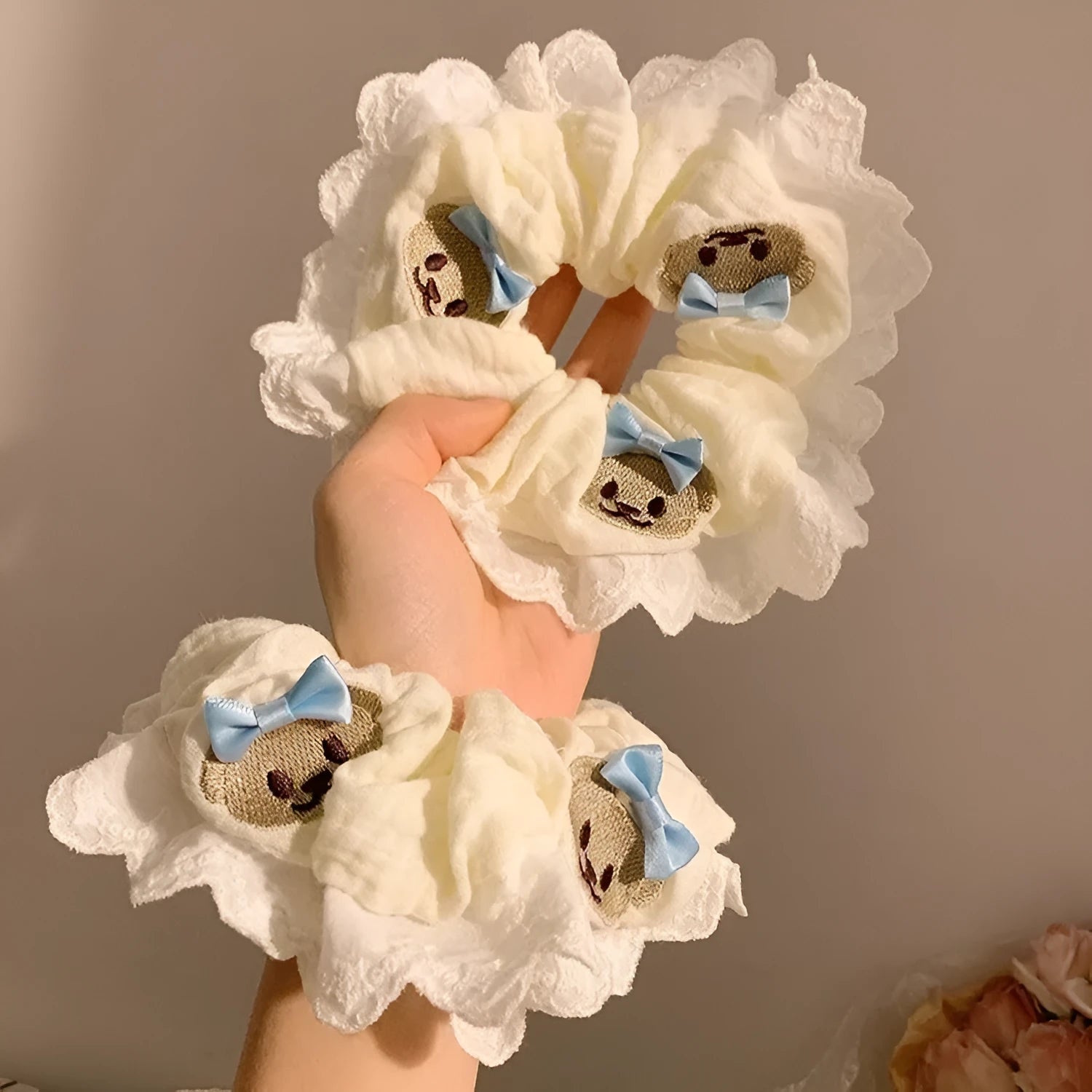 Bear blue cloth hair ring with bowknot design and high elasticity construction