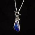 Women's alloy snake bones chain necklace with geometric pendant in blue colour option