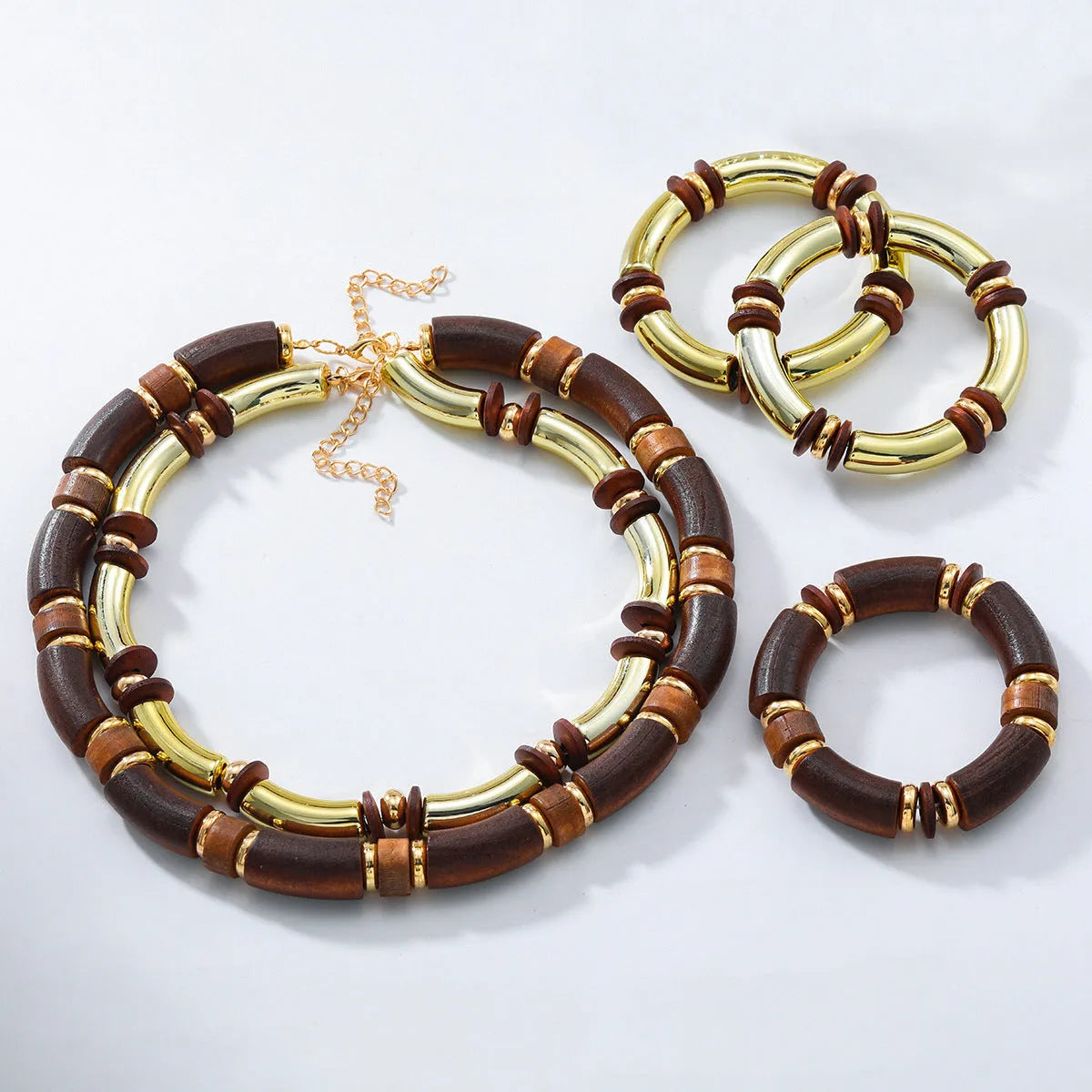 Women's exaggerated multi-layer necklace and bracelet set in alloy with round pendant elements