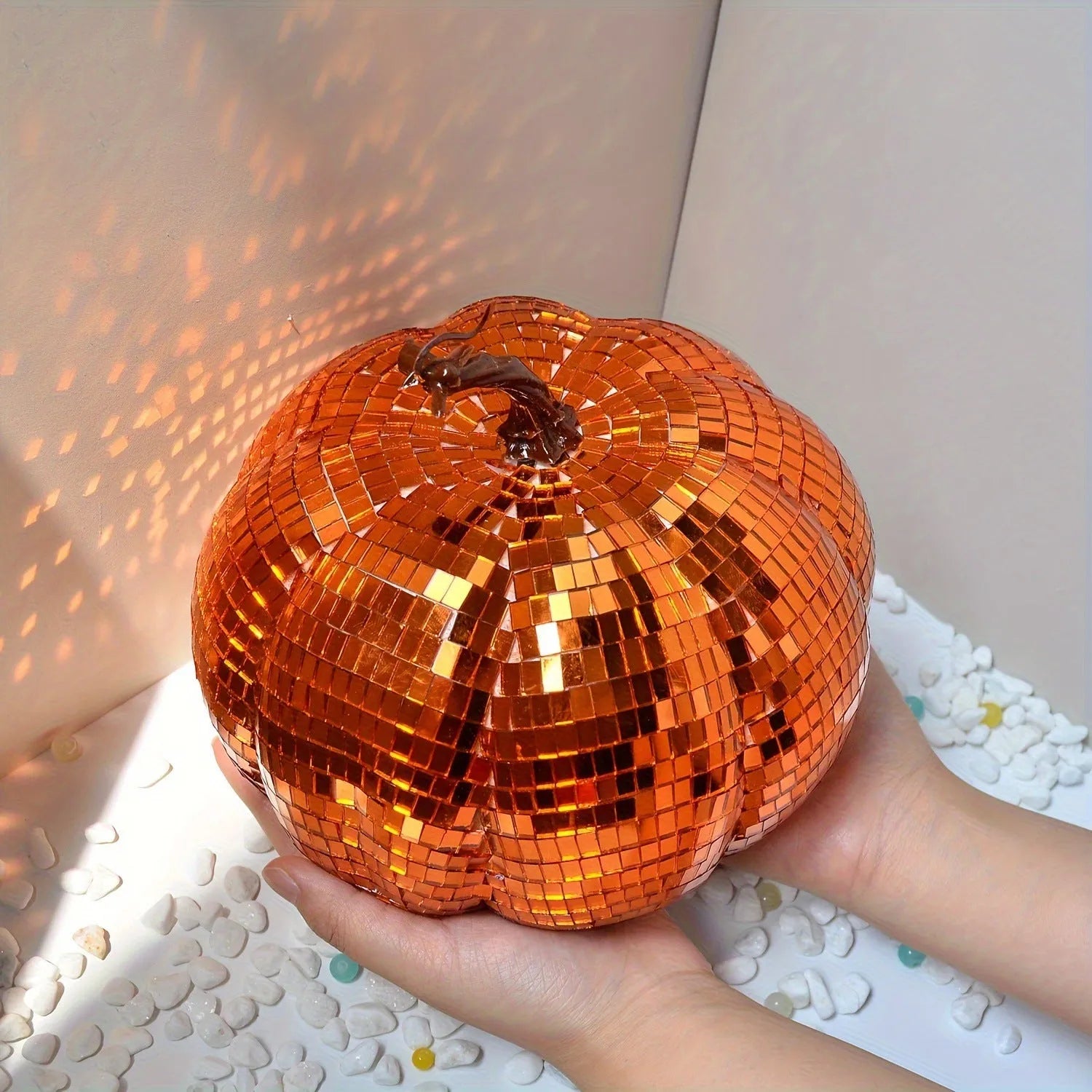 Chinese style glass pumpkin mirror decoration in bionic design for Halloween and home decor.