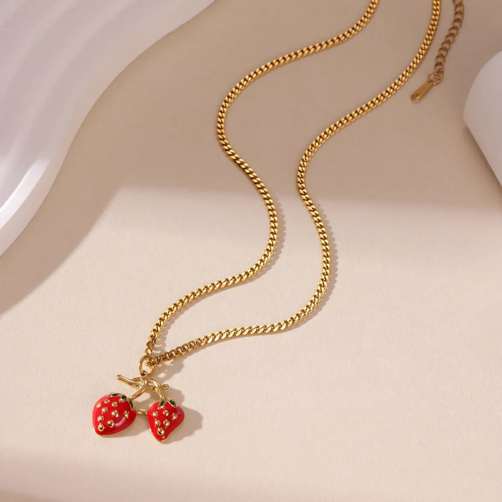 Stainless steel strawberry pendant necklace on alloy chain in red or white gradient colour