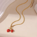 Stainless steel strawberry pendant necklace on alloy chain in red or white gradient colour
