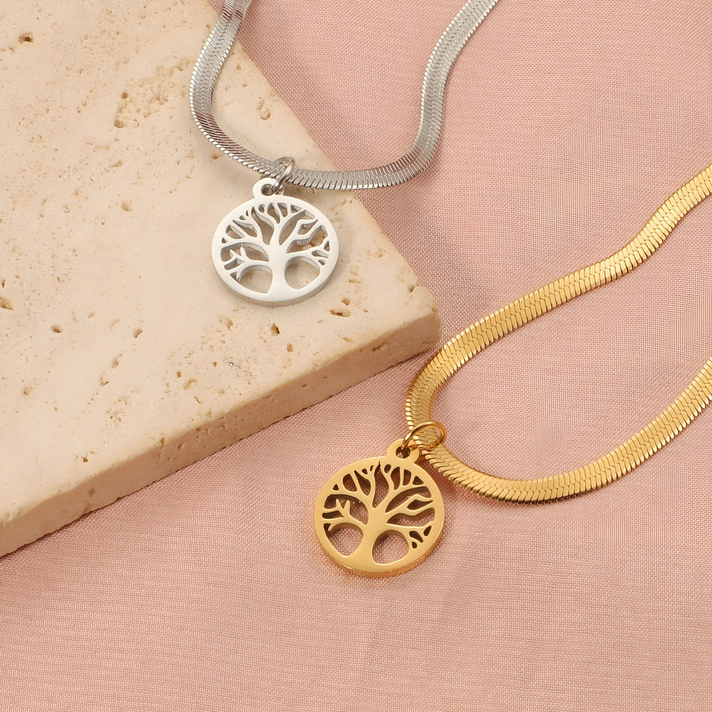 Stainless steel lucky tree pendant necklace on snake bones chain with U-shaped clasp, shown in gold and steel colour options.