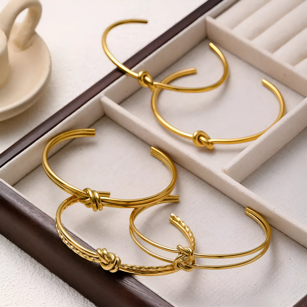 Adjustable stainless steel C-shaped bracelet with double-layer knotted design in gold or silver finish