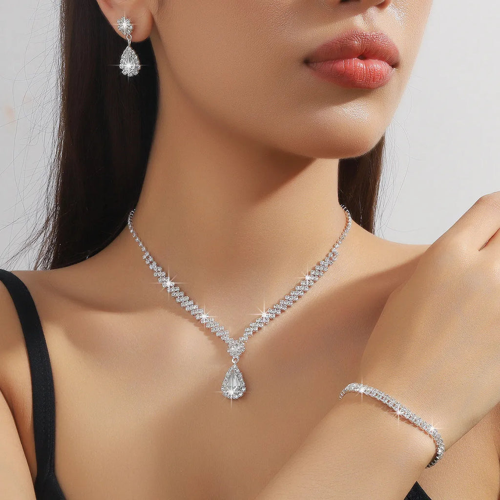 Claw chain rhinestone necklace and matching earrings set with water drop shapes