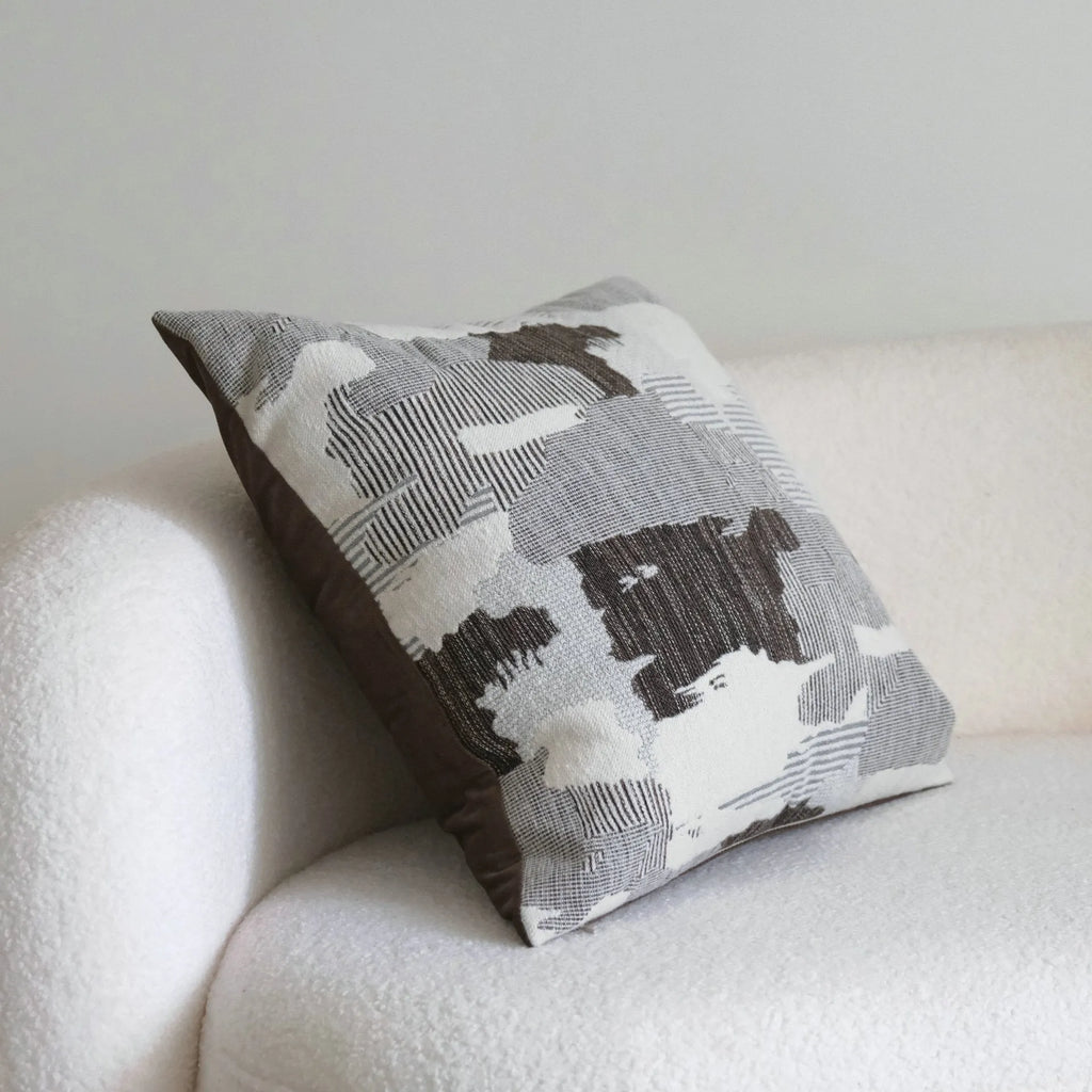 Coffee brown striped mid-century modern cushion with Chinese classical design on sofa
