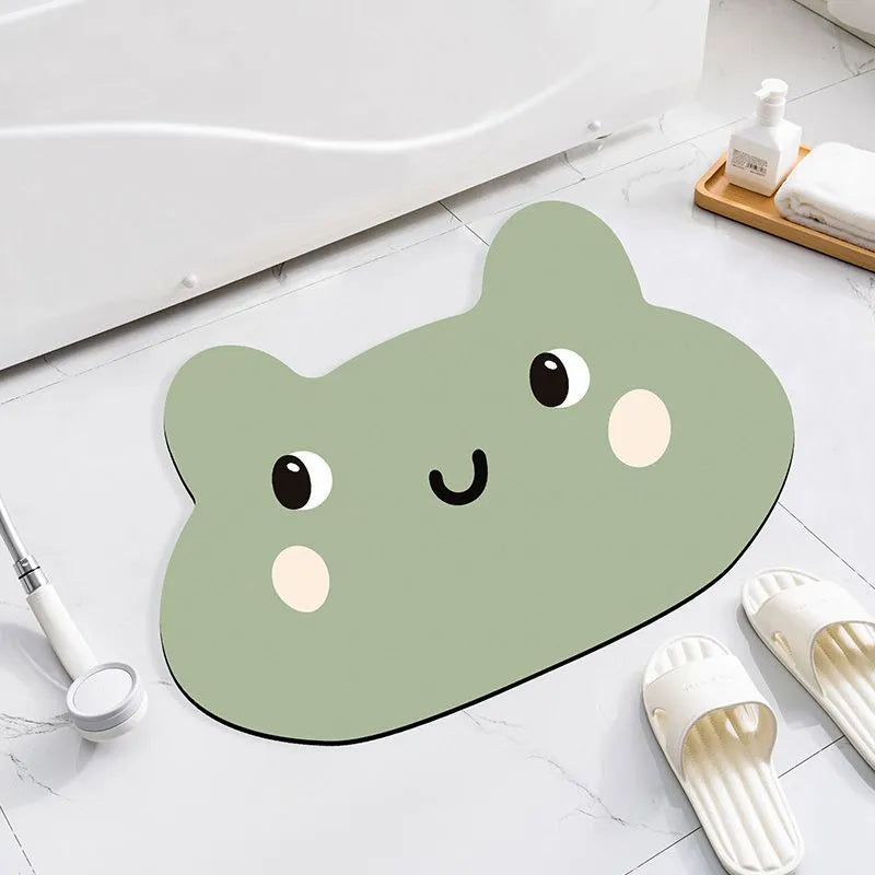 Thickened diatom ooze absorbent bathroom mat with cartoon animal design on a bathroom floor.