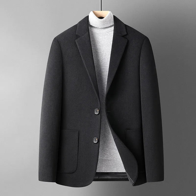 Men's slim fit wool suit jacket in grey, shown on a model, suitable for autumn and winter leisure wear.