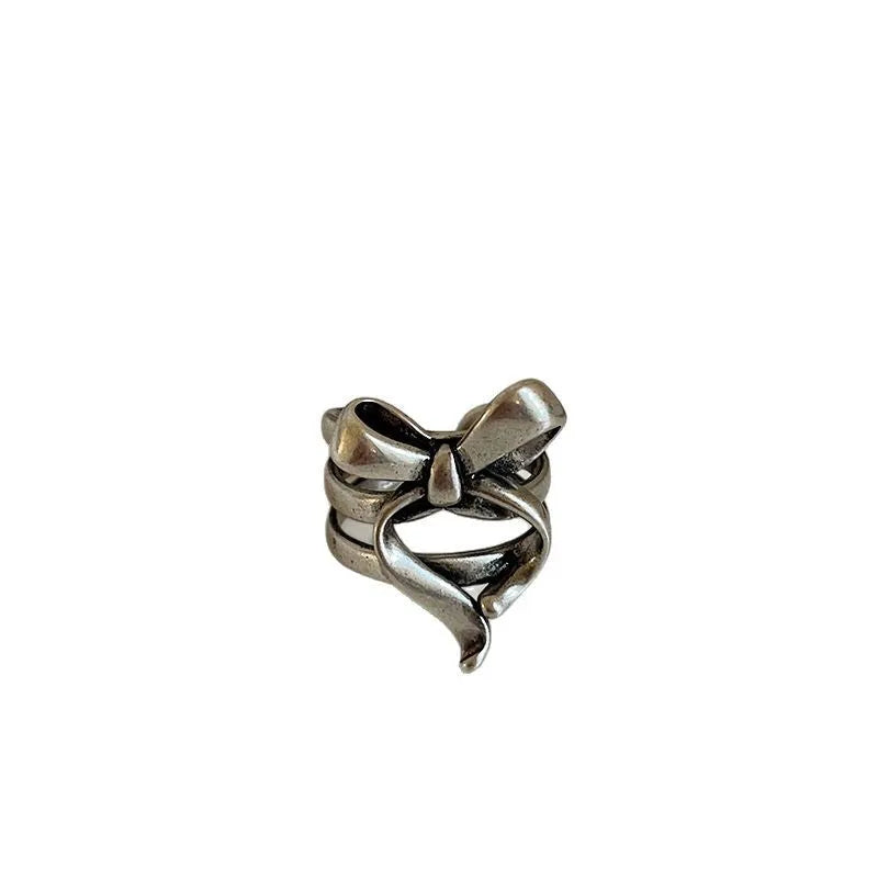 Gold plated wide open ring with retro distressed bow front and geometric metal shape for women