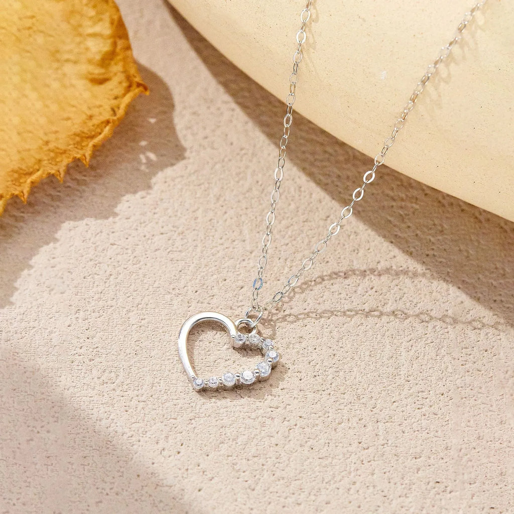 S925 sterling silver hollow heart necklace with 18K gold or white gold plating and regular chain style for women