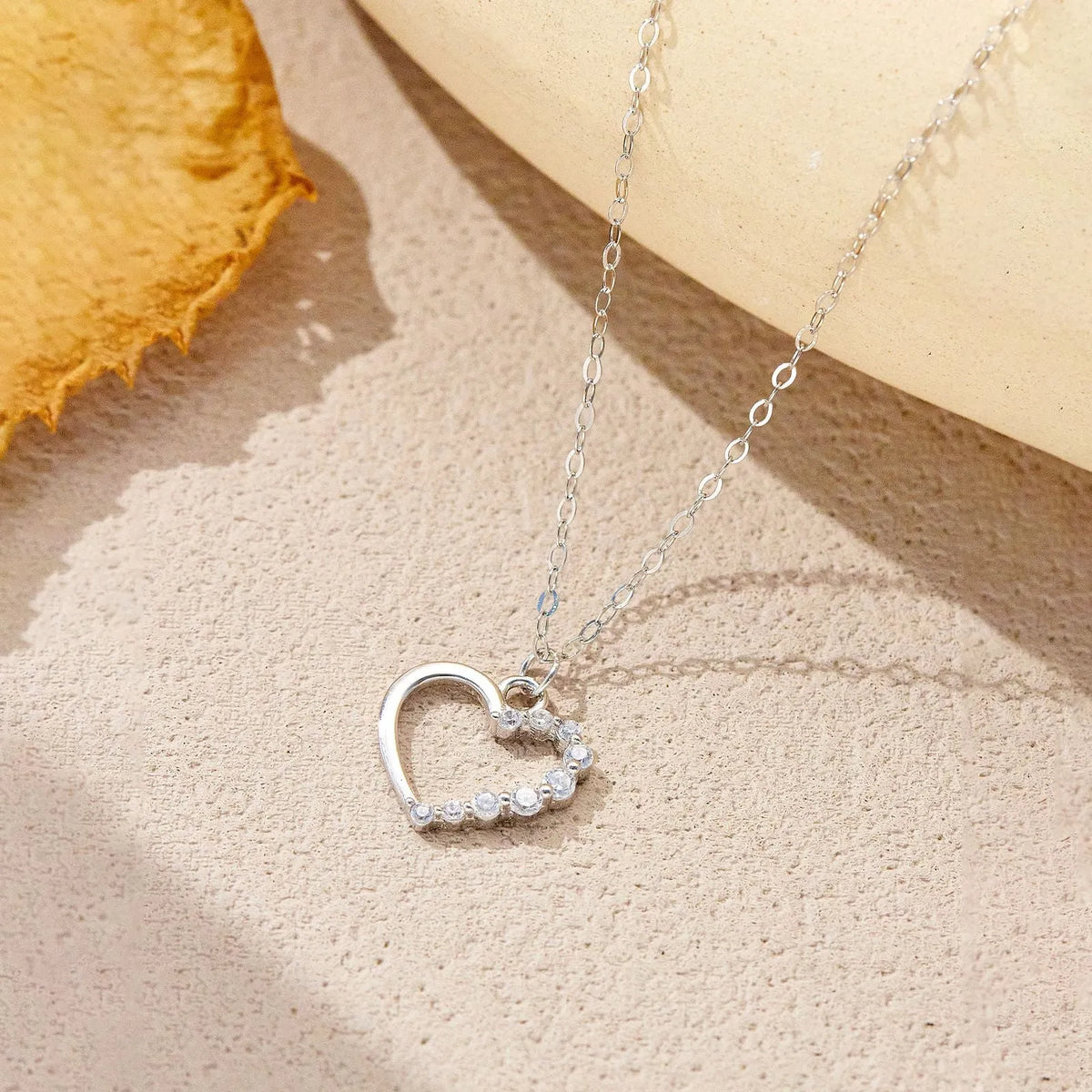 S925 sterling silver hollow heart necklace with 18K gold or white gold plating and regular chain style for women