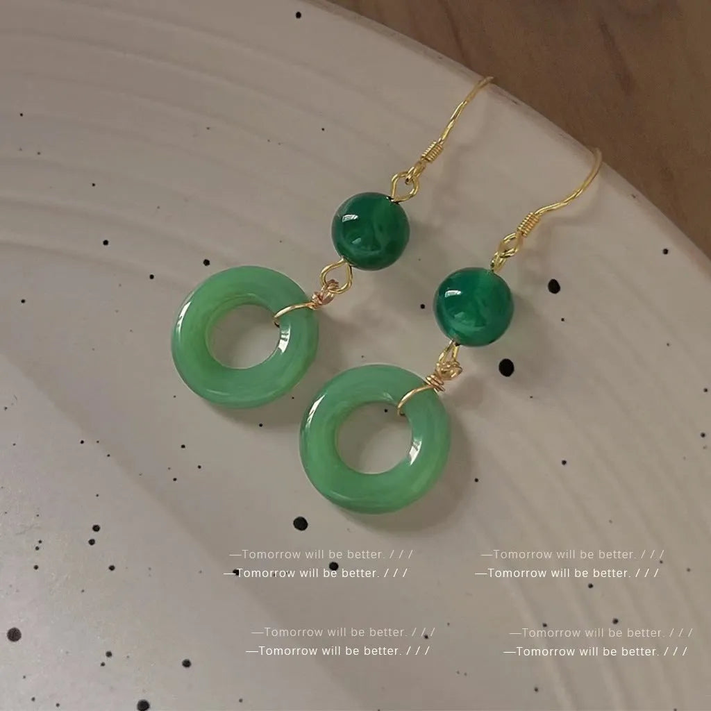 Geometric peace buckle earrings in jade green with 14K gold plating and Chinese cheongsam design