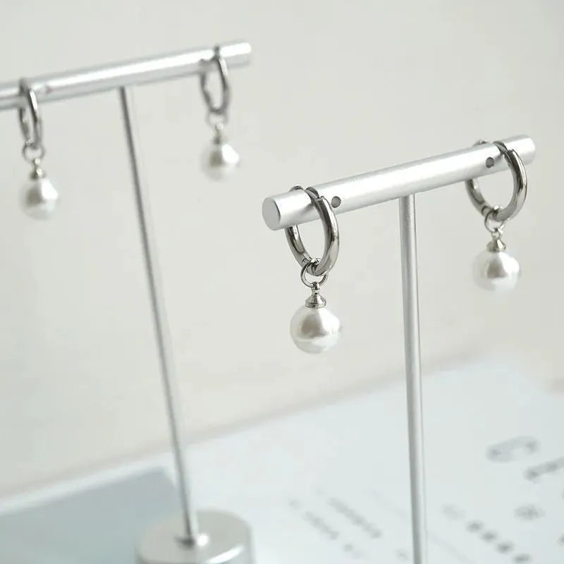 Women's geometric pearl earrings with hip hop style and titanium steel posts
