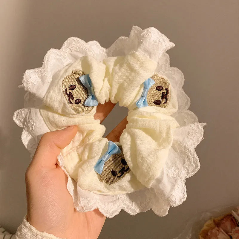 Bear blue cloth hair ring with bowknot design and high elasticity construction