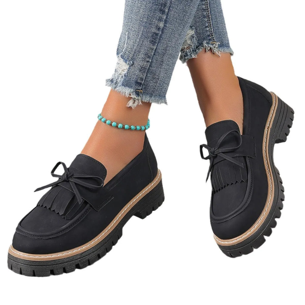 Plus size women's loafers with chunky heel in black and brown colours showing round toe design