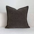 Coffee brown striped mid-century modern cushion with Chinese classical design on sofa