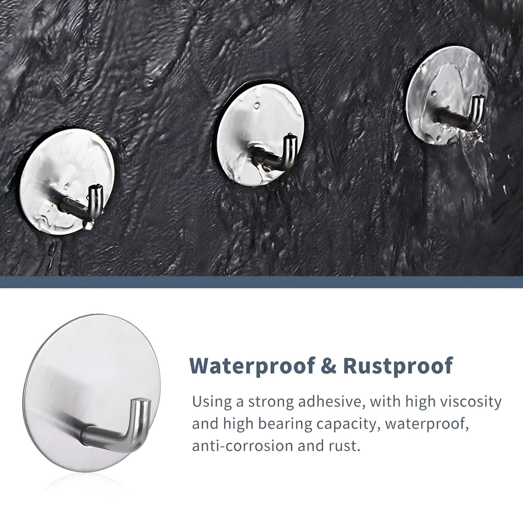 Pair of round stainless steel self-adhesive hooks, one black sanded and one polished, for bathroom or kitchen wall mounting.