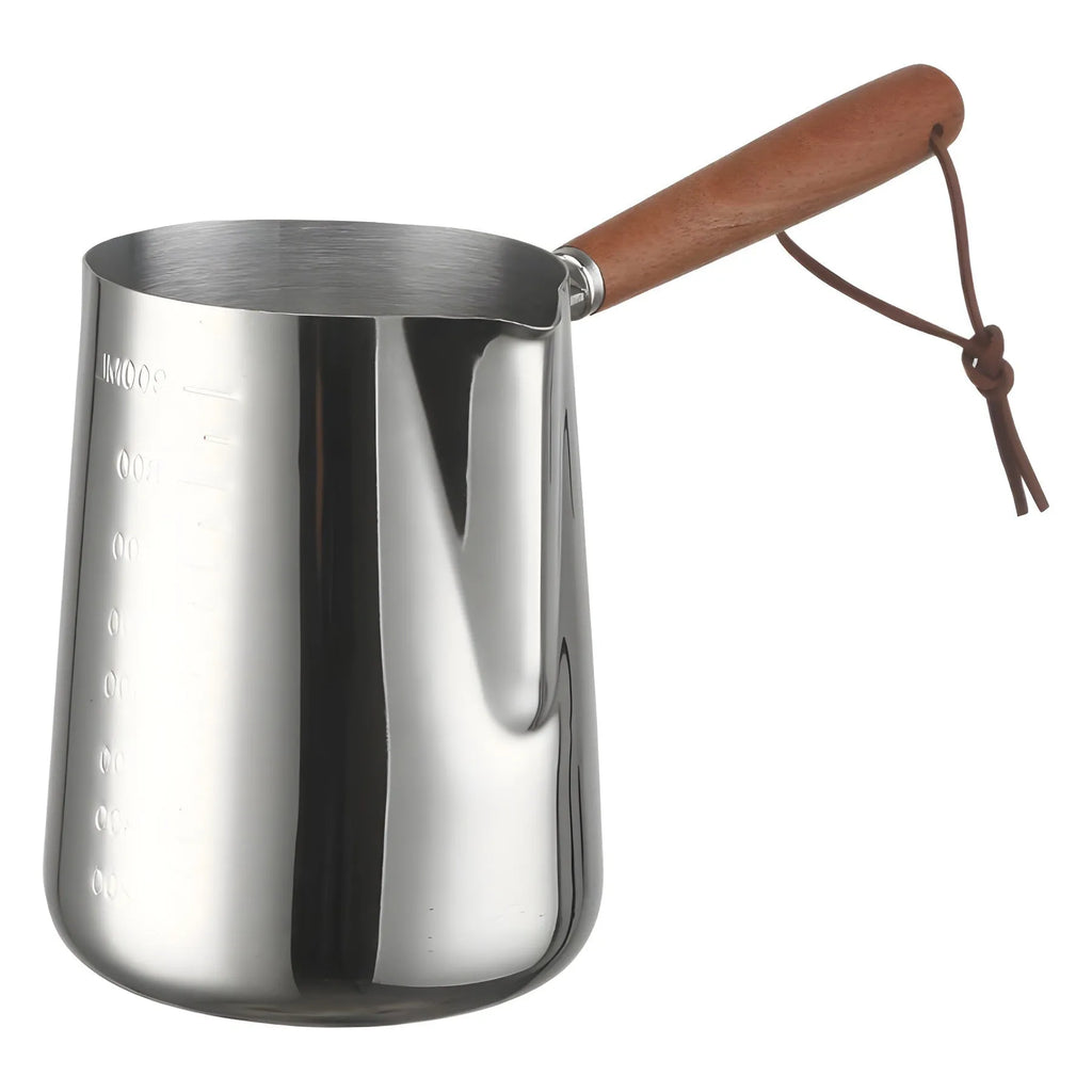 Stainless steel milk frothing pitcher with interior measurement scale and wooden handle
