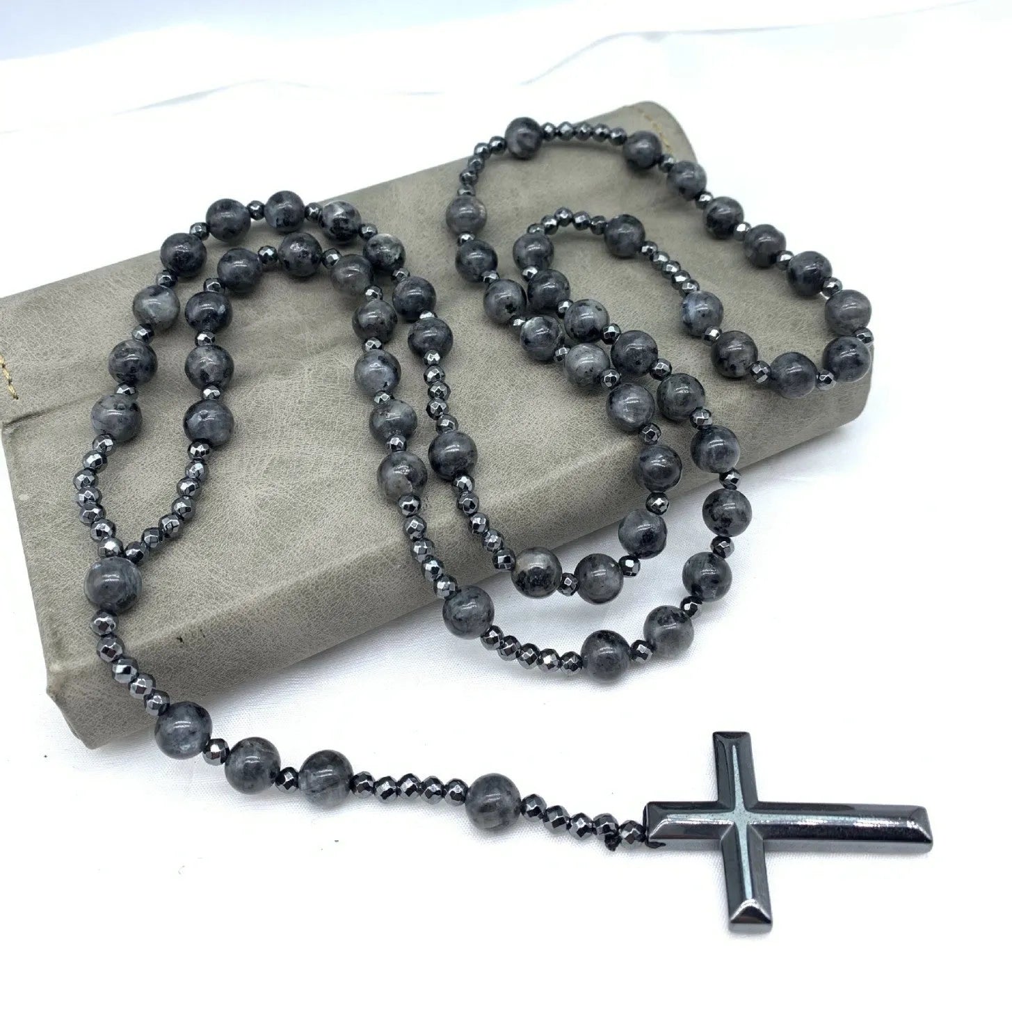 Men's geometric stone cross pendant on a silver ball bead chain with safety lock clasp