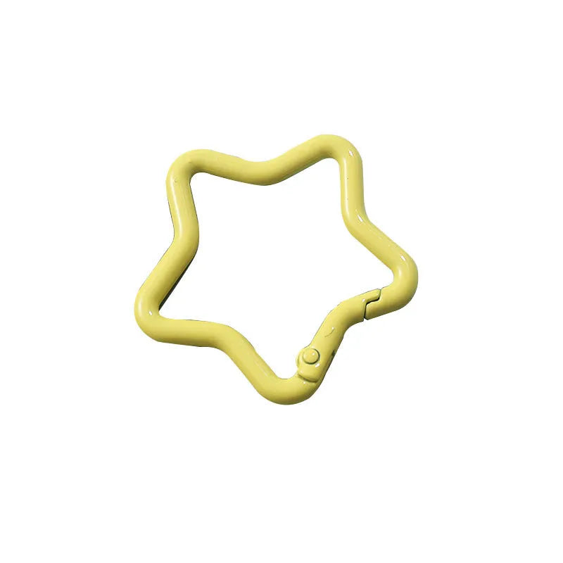 Zinc alloy five-pointed star keychain in macaron colours like light pink and green.