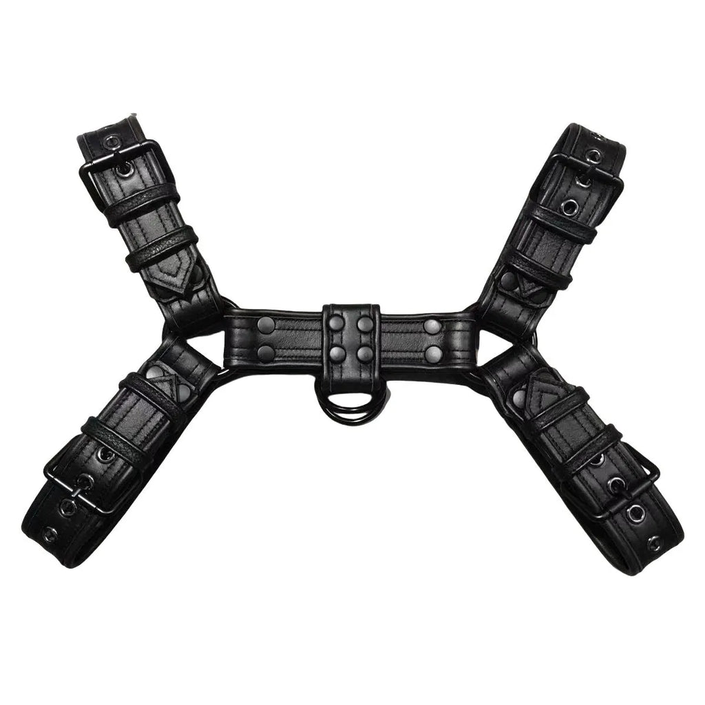 Black leather chest bondage strap with metal buckles on male torso