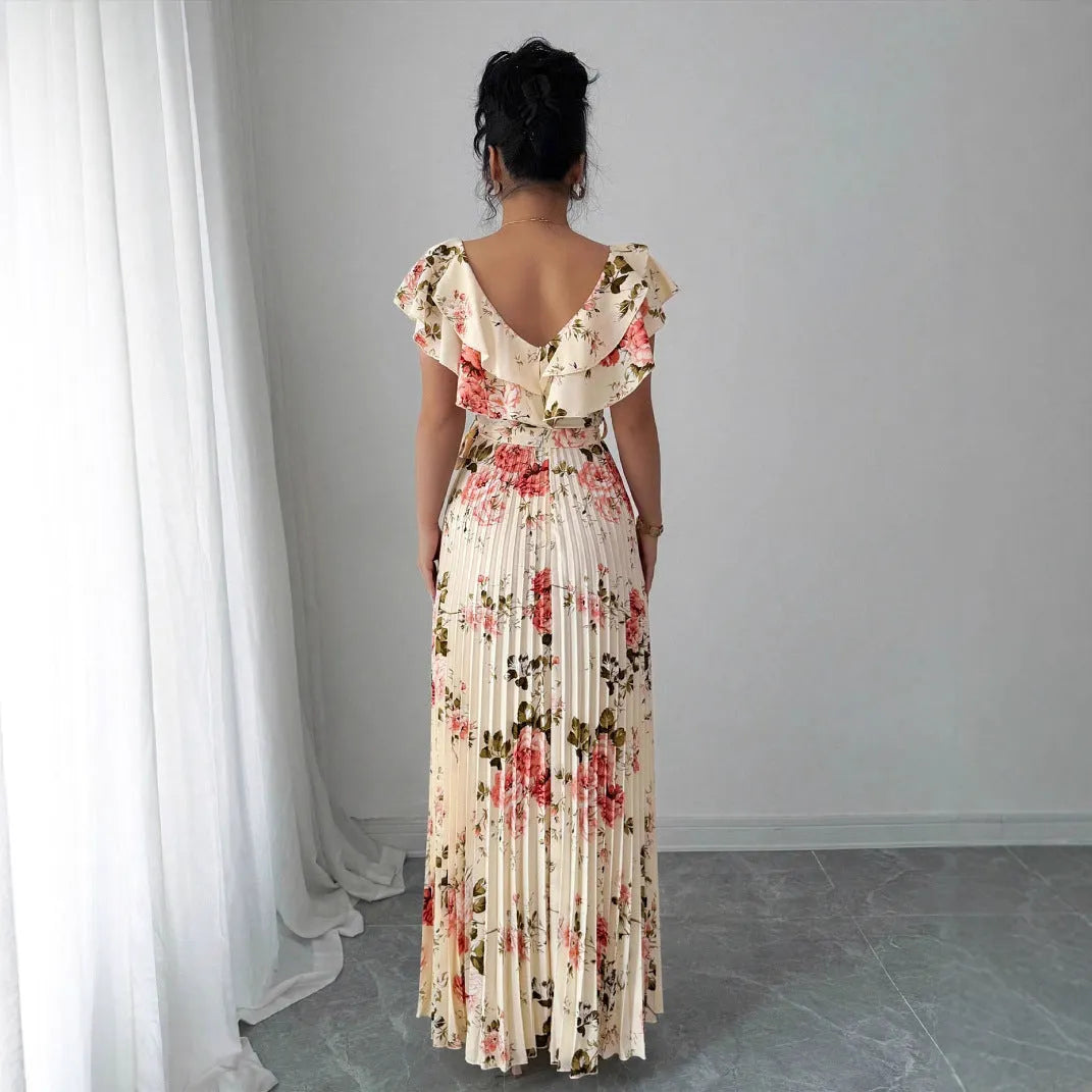 Apricot-coloured women's V-neck dress with a digital floral print, ruffled short sleeves, and a flowing oversized swing skirt.