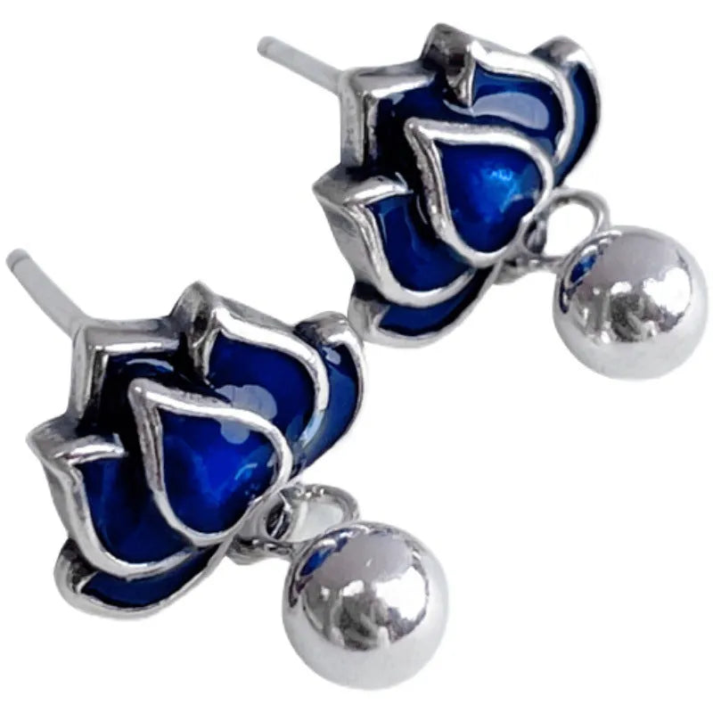 Blue Lotus earrings with lotus flower stud and seedpod tassel in vintage artistic style