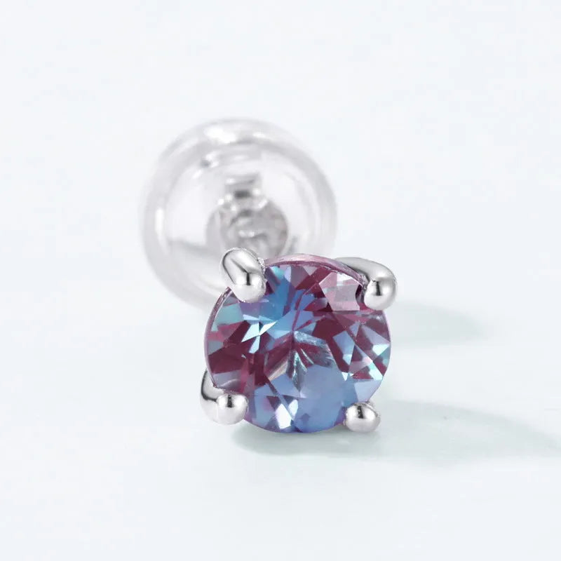 A pair of simple geometric ear studs with a round Alexander stone, made from 925 sterling silver.