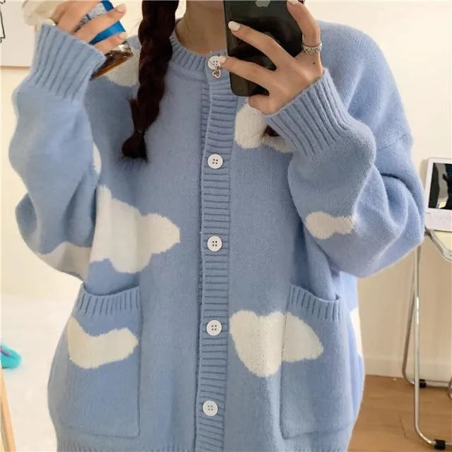 Blue cloud pattern women's loose cardigan sweater with long sleeves.