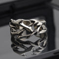 Copper thorn flower ring with geometric design and adjustable opening in J2150 colour