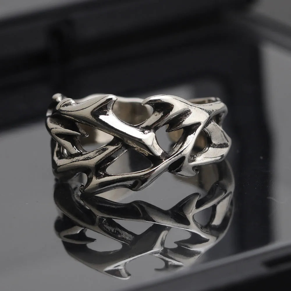 Copper thorn flower ring with geometric design and adjustable opening in J2150 colour