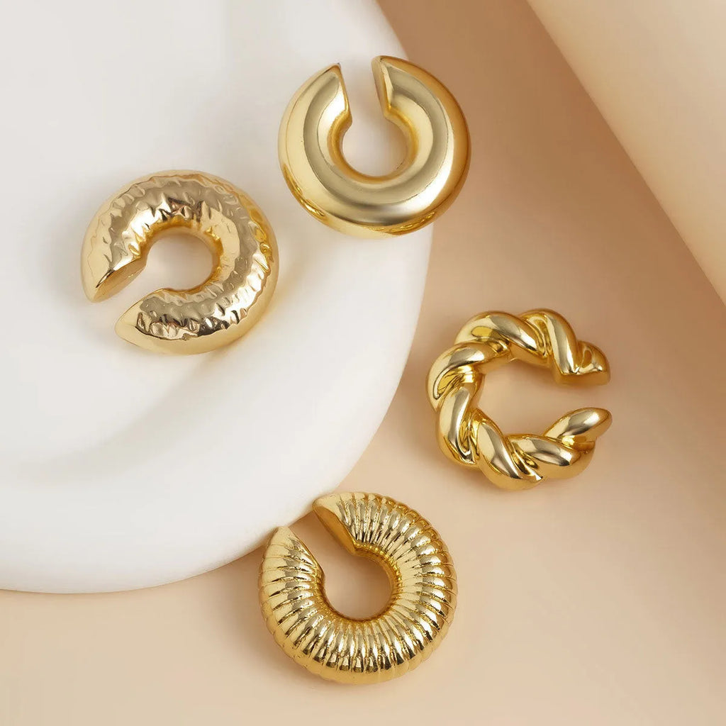 Set of four geometric gold and silver ear clips for non-pierced ears, ins style.
