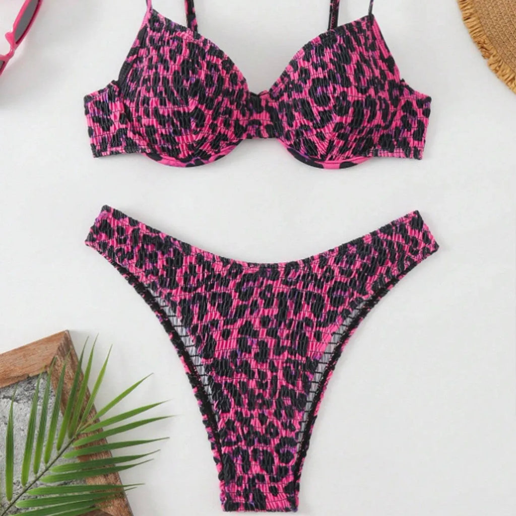 Brown leopard print women's backless bikini swimsuit on a white background
