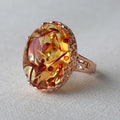 Amber beeswax ring in New Amber Type A colour with retro ethnic design on alloy band
