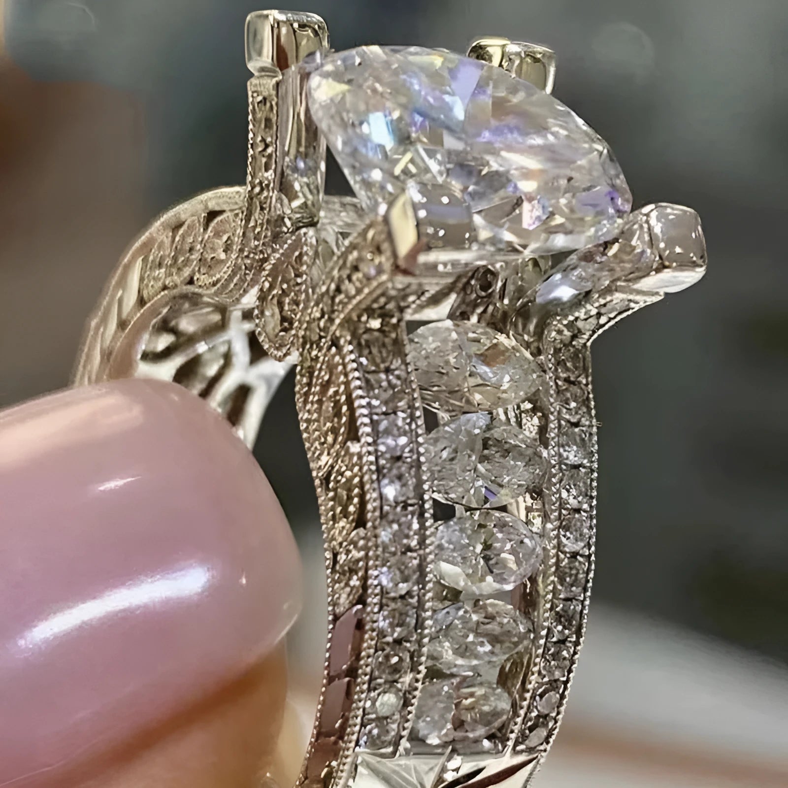 Women's geometric alloy ring with electroplated gold or white finish showing round design elements and available in sizes 5-13