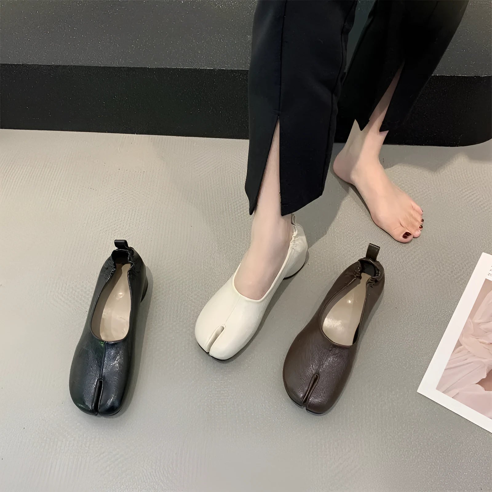 Women's apricot chunky heel pumps with a round toe and distinctive split toe horseshoe design.