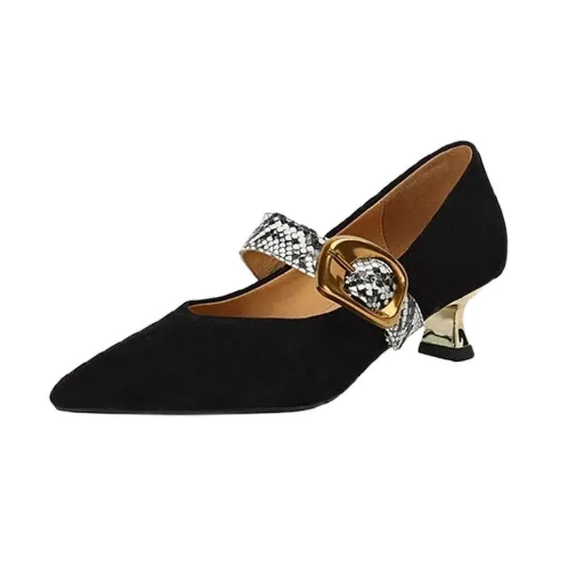 Women's black low-cut pointed stiletto heels with a silver buckle fastening on the ankle strap.