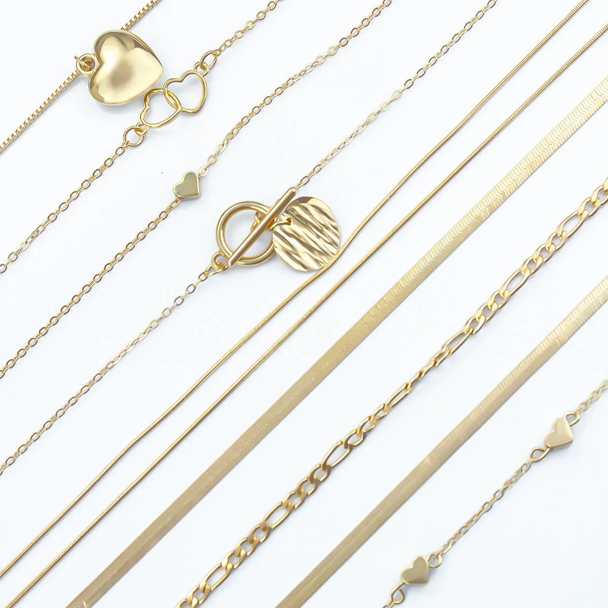 Women's 10 piece necklace set with gold electroplated finish and snake bone chain design