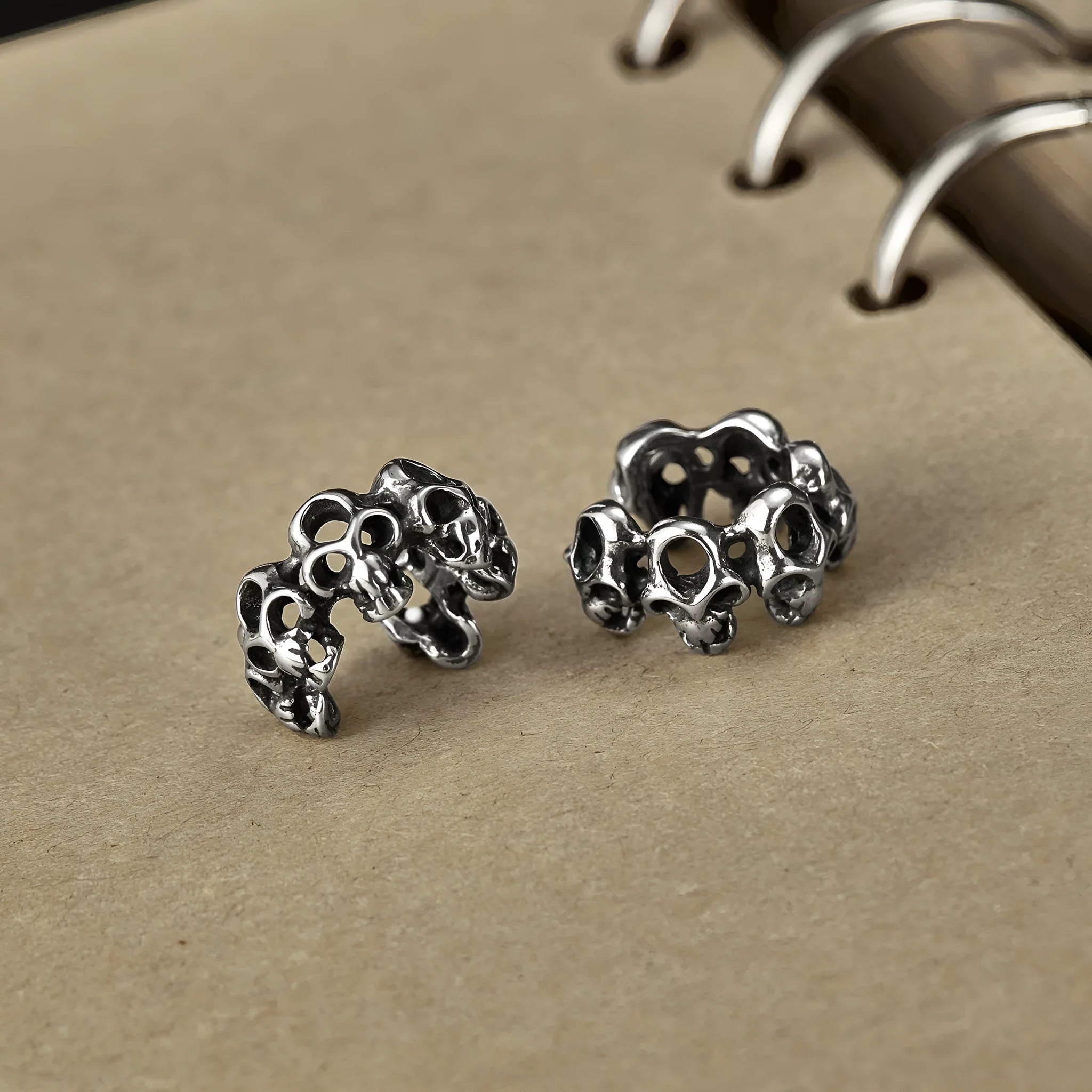Stainless steel skull ear clips with hollow geometric design and clip mechanism