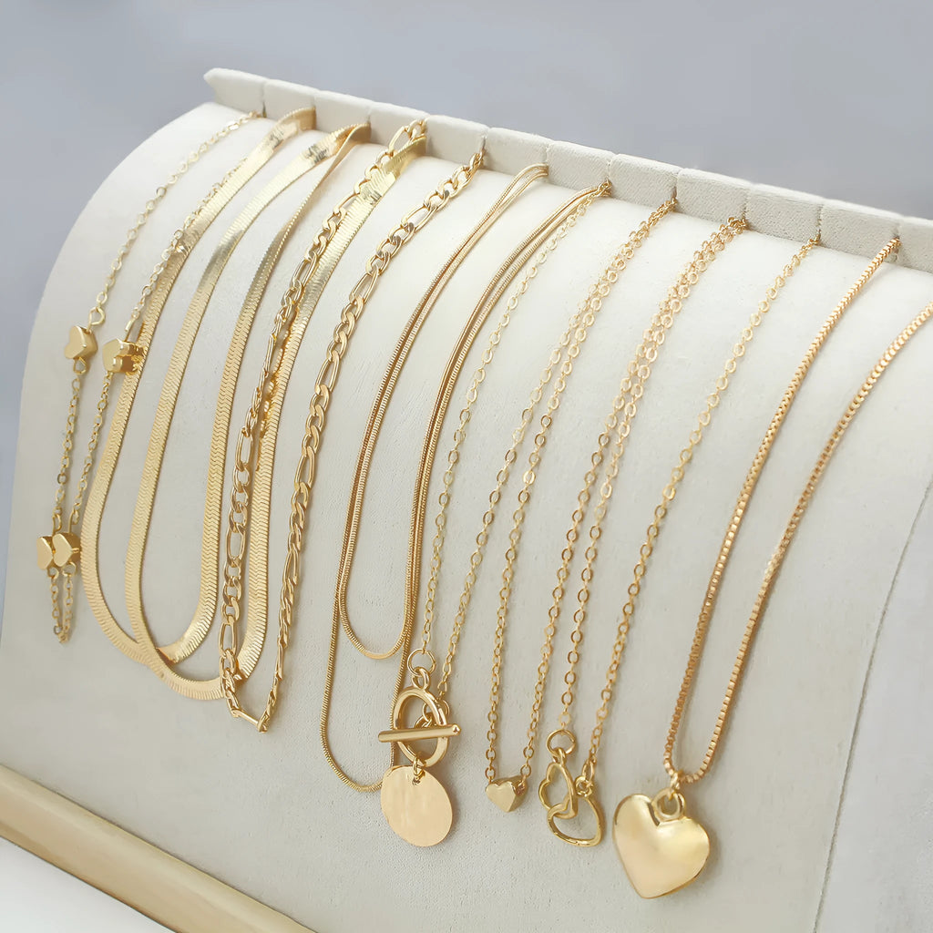 Women's 10 piece necklace set with gold electroplated finish and snake bone chain design
