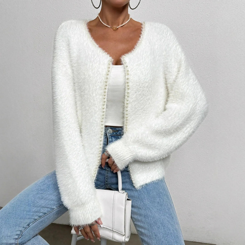 White women's V-neck cardigan with bead knit detail on medium thickness polyester fabric