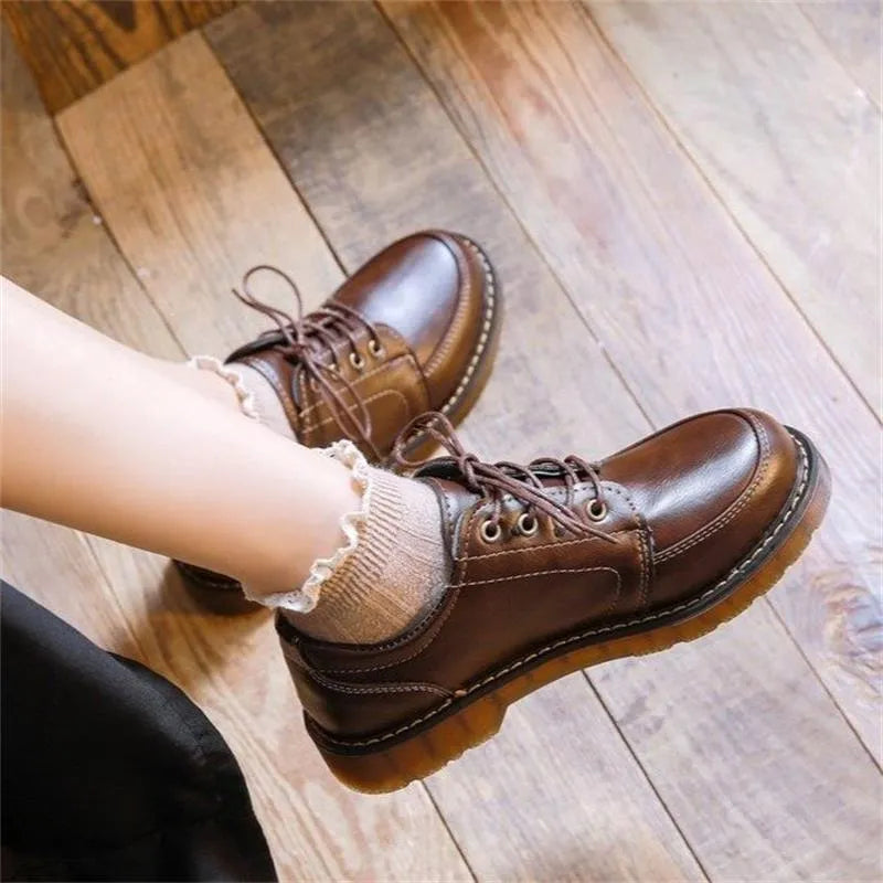 Women's black retro college-style Mary Jane shoes with square low heel and front lace-up closure