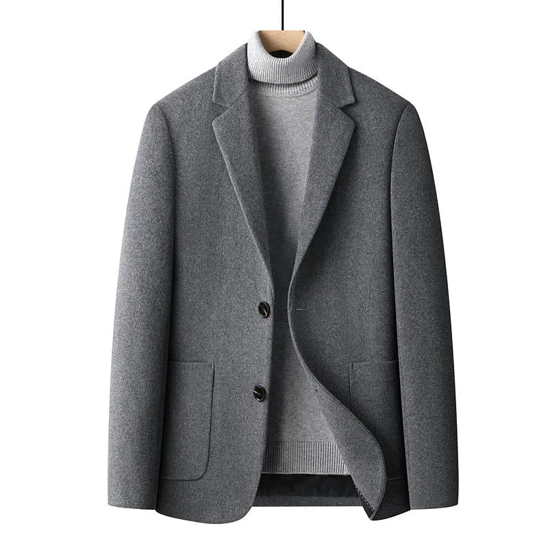 Men's slim fit wool suit jacket in grey, shown on a model, suitable for autumn and winter leisure wear.
