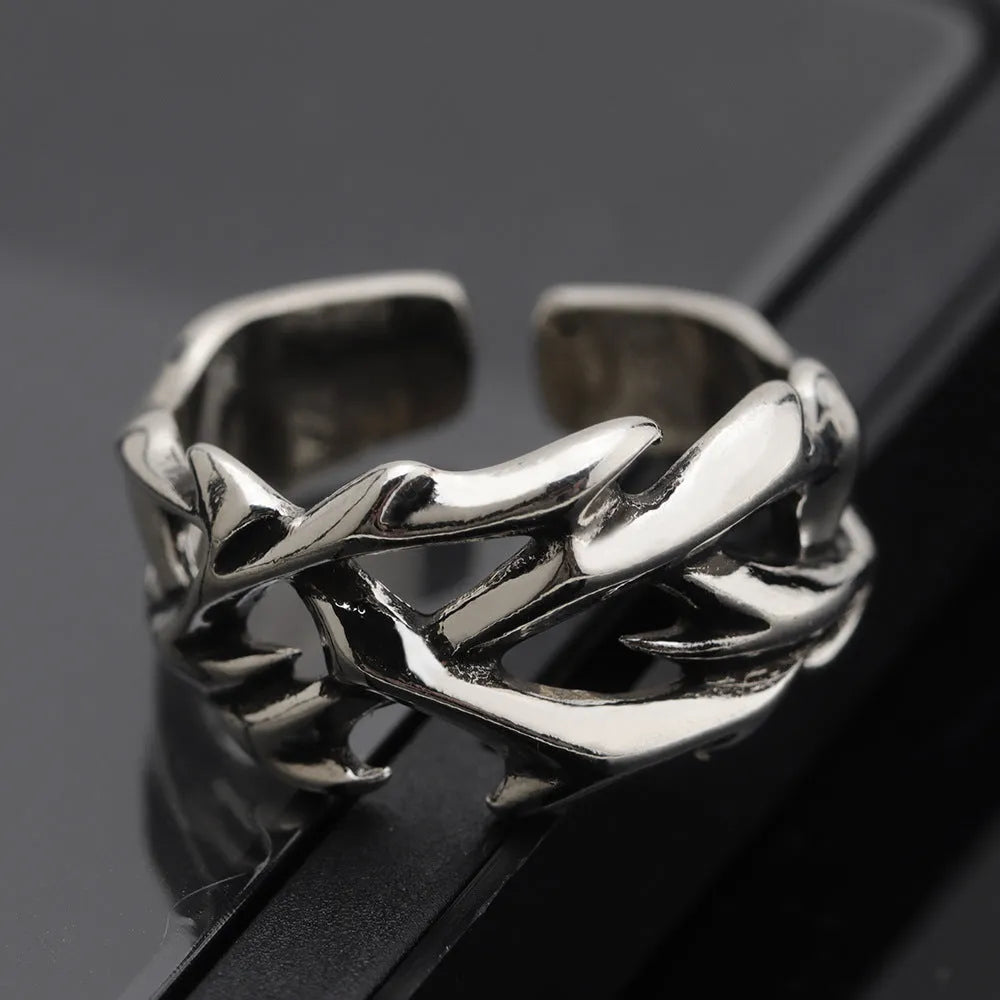 Copper thorn flower ring with geometric design and adjustable opening in J2150 colour