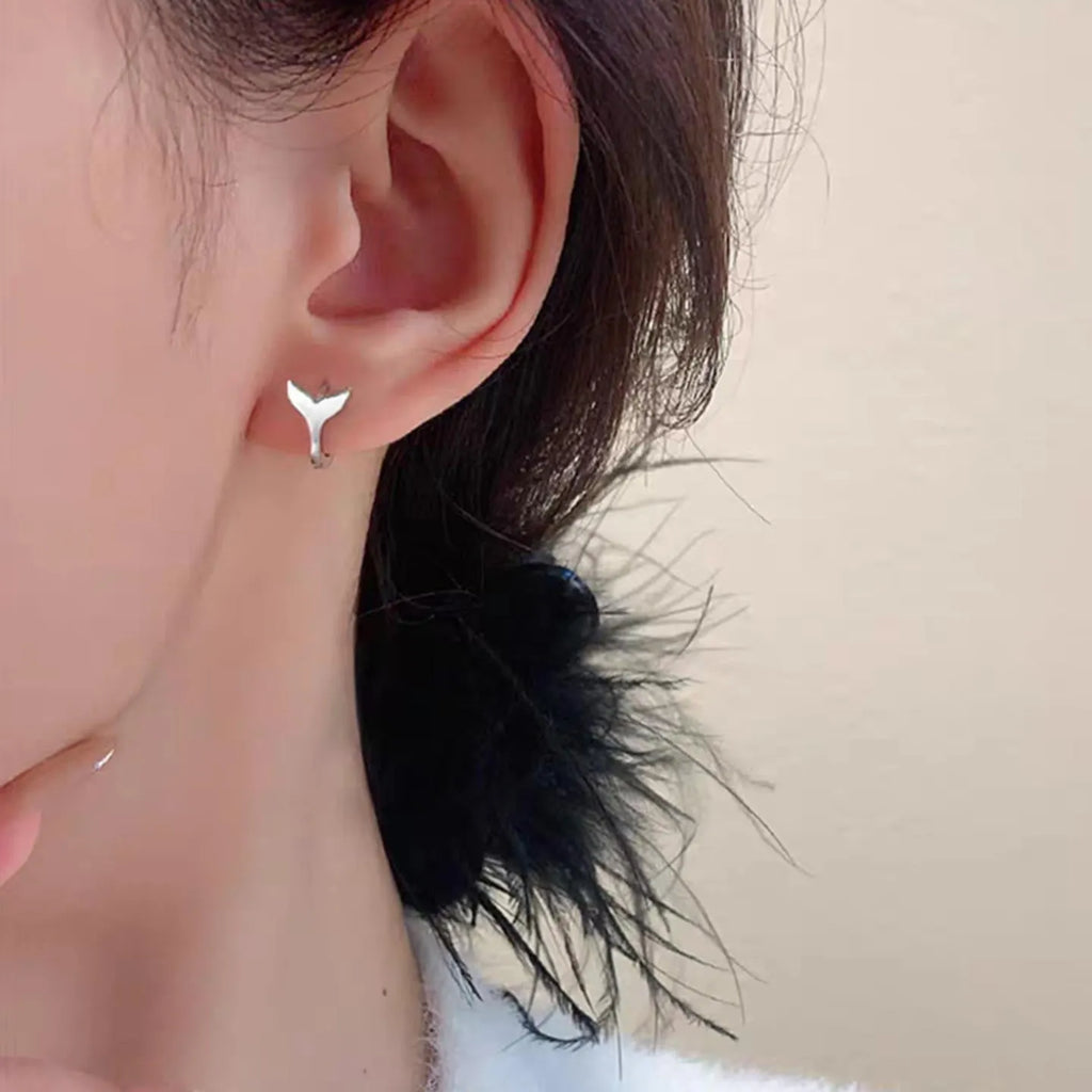 A pair of women's simple fishtail design earrings with an electroplated finish in a choice of colours.