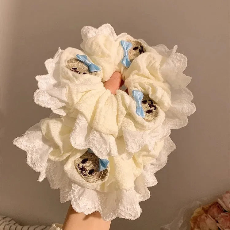 Bear blue cloth hair ring with bowknot design and high elasticity construction