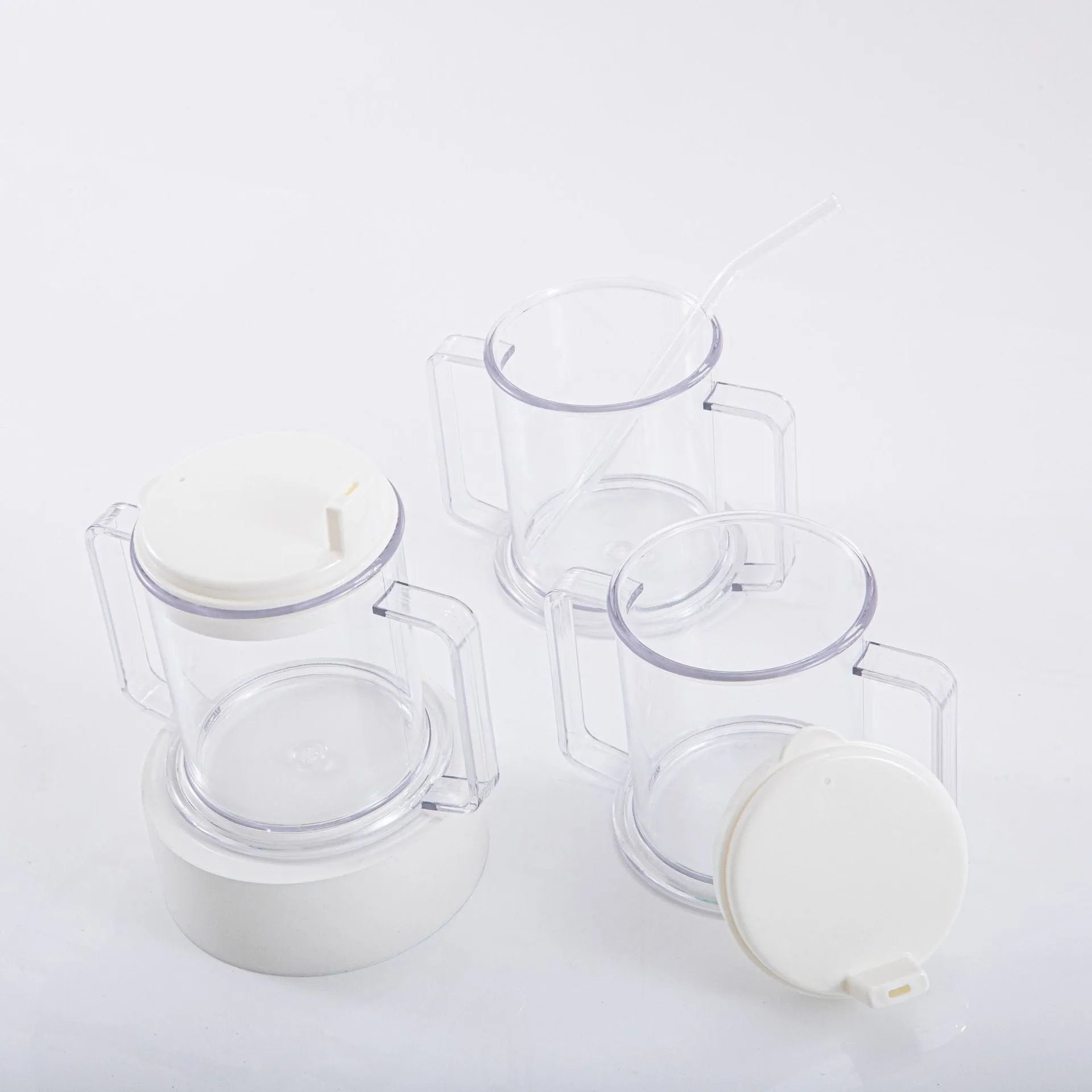 Clear transparent plastic spill-proof drinking cup with modern design.