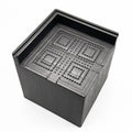 Four black plastic furniture risers or feet for beds and sofas