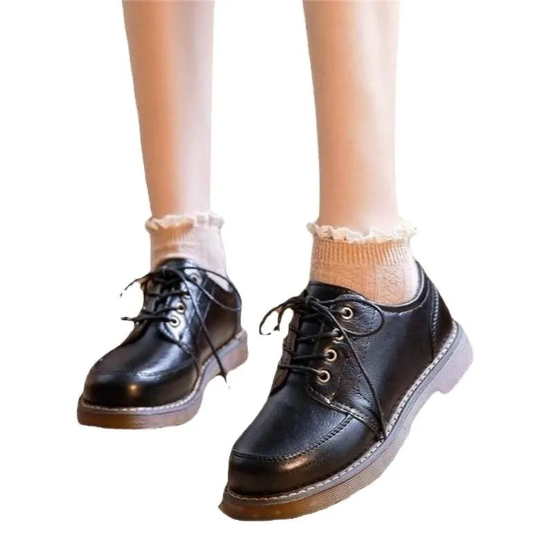 Women's black retro college-style Mary Jane shoes with square low heel and front lace-up closure